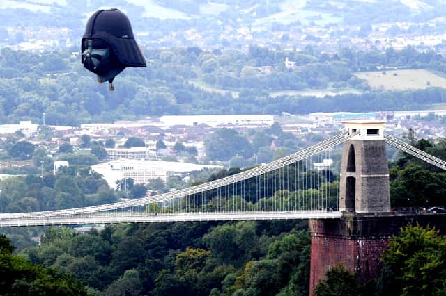 Darth Vader balloon above Clifton Suspension Bridge during a hot air balloons mass ascent.