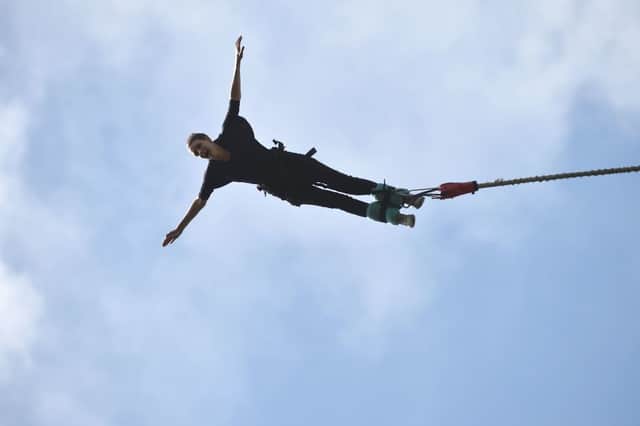 A person  makes a bungee jump. Photo for illusrative purposes.