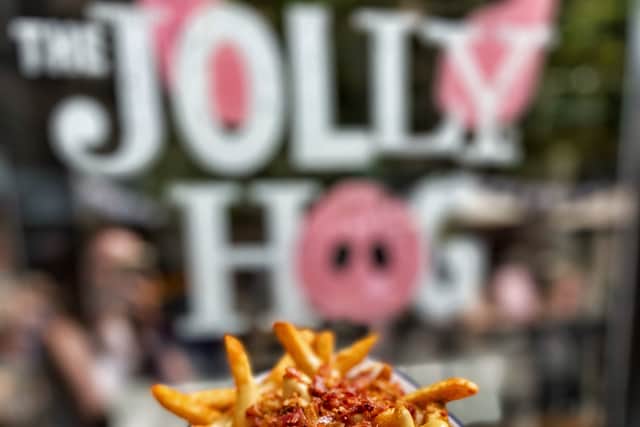 Bacon cheese fries from The Jolly Hog.
