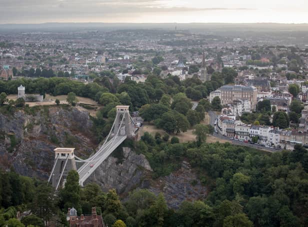<p>Clifton Suspension Bridge spans across the Avon Gorge with the city in the background</p>
