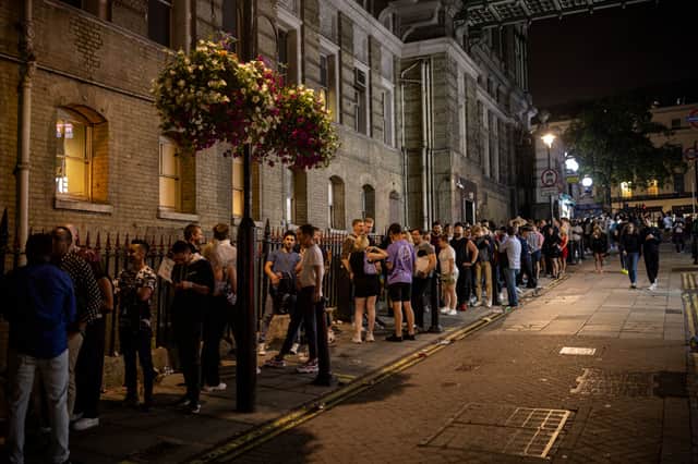 LONDON, ENGLAND - JULY 24: A long queue of club-goers waiting to get in to Heaven nightclub on July 24, 2021 in London, England (Photo by Rob Pinney/Getty Images)