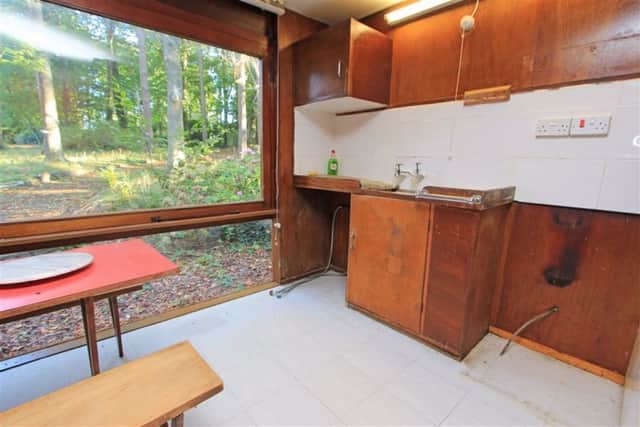 The property is believed to have been left mostly untouched since it’s build in the 1950s. The kitchen still boasts its original units.