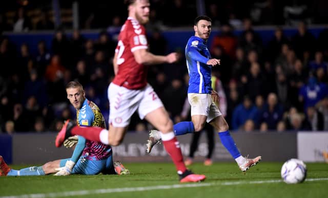 <p>Daniel Bentley could only watch on as he conceded to Scott Hogan. (Photo by Nathan Stirk/Getty Images)</p>
