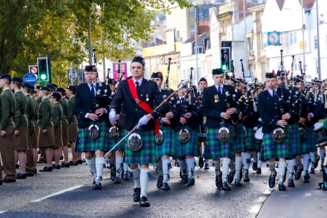 Bristol Pipe Band and Drummers Marching at Remembrance Day Parade in Bristol in 2019