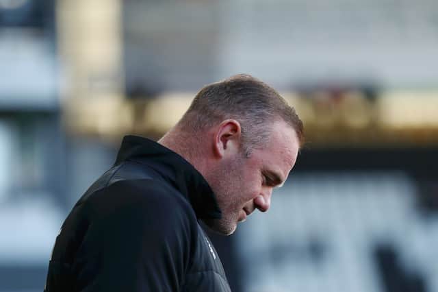 Wayne Rooney has had a lot to contend with in his start to life in management. (Photo by Cameron Smith/Getty Images)