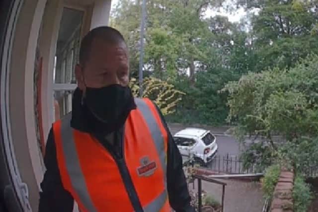 Police want to speak to this man wearing an orange high-vis tabard with what appears to be a Royal Mail logo