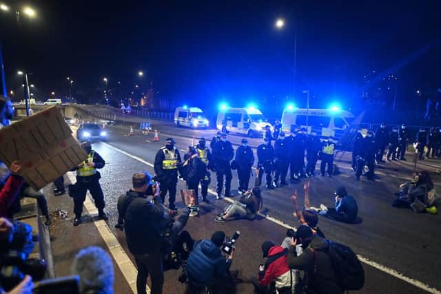 Police form a cordon at Newfoundland Road leading to the M32 during the Kill the Bill protest. 