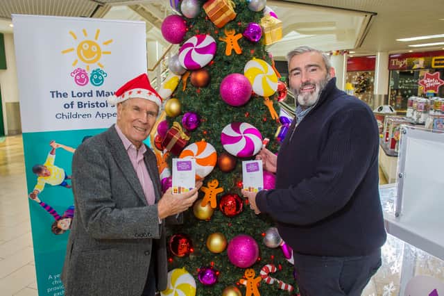Bruce Simmonds, chairman of The Lord Mayor of Bristol’s Children Charity with David Wait, centre manager at The Galleries, at The Giving Tree