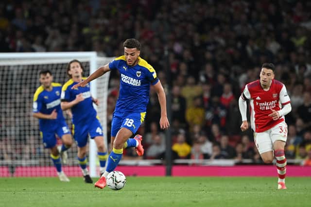 <p>AFC Wimbledon defender Nesta Guinness-Walker is a rumoured target. (Photo by JUSTIN TALLIS/AFP via Getty Images)</p>