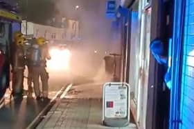 Fire crews hosed down the Voi scooter for two hours after it started burning