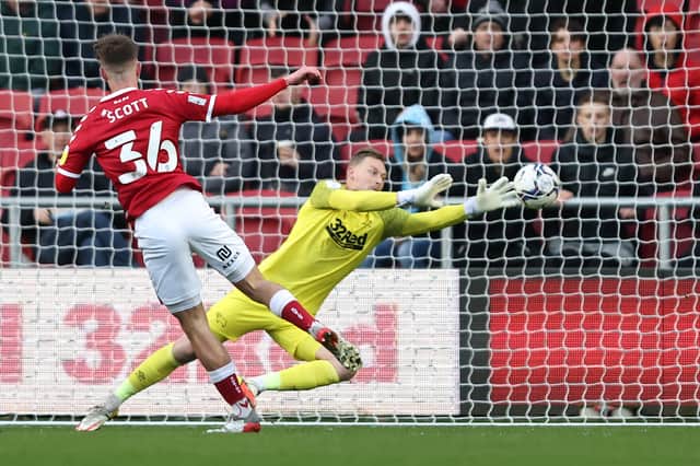 Alex Scott, pictured scoring the opening goal for Bristol City against Derby County earlier this month, has been getting attention from Premier League clubs 