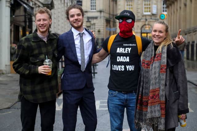 Milo Ponsford, Sage Willoughby, Jake Skuse and Rhian Graham, collectively known as the ‘Colston 4’, pose for a photograph outside Bristol Crown Court where they are being tried in connection with the toppling of a statue of 17th century slave trader Edward Colston.