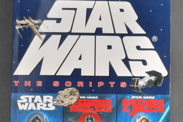 A Star Wars script book autographed by over two hundred original cast and crew worth £1500 to £2500. 