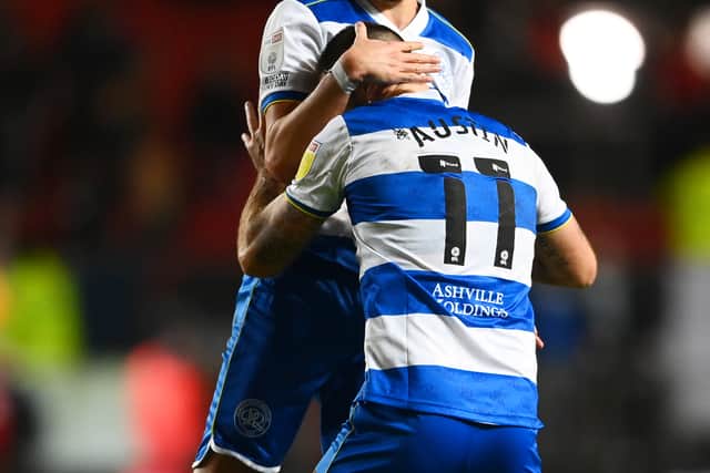 Yoann Barbet and Charlie Austin of Queens Park Rangers celebrate their side’s victory over Bristol City