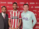 Miguel Freckleton (centre) with his agent Arfan Rehman and Sheffield United manager Paul Heckingbottom
