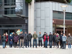 Residents stand united as they are campaigning against a late night Brewdog at a former Costa Coffee chain in Millennium Promenade in Bristol.