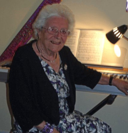 Rita Hookway on her 90th birthday. She was a church organist and pianist who ‘filled the house with music’ was Jane was a child.