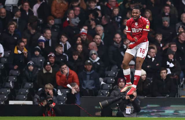 <p>Antoine Semenyo jumps high as he celebrates scoring against Fulham.</p>