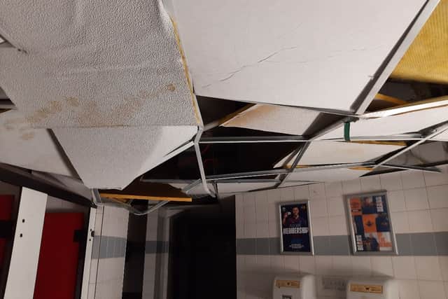 The pictures show extensive damage to the ceiling.