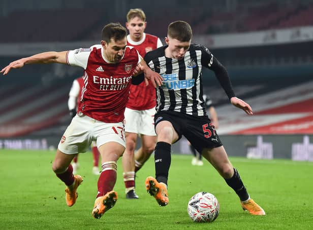 <p>Elliot Anderson made his first-team debut for Newcastle United in 2021. (Photo by GLYN KIRK/AFP via Getty Images)</p>