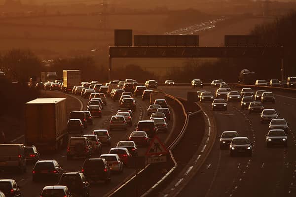 Congested commuter traffic queue as they pass junction 18 on the M4 motorway at rush hour in Bristol (Photo by Matt Cardy/Getty Images)