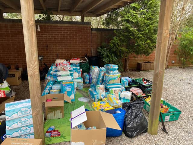 Supplies stacked up in Anna Habarova’s garden after she organised an appeal for donations to help the people of Ukraine following the Russian invasion.