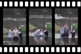 Stills from a video of a man being baptised in flood water at a roundabout in Hartcliffe
