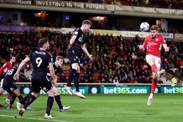 Michal Helik of Barnsley scores their side’s second goal.