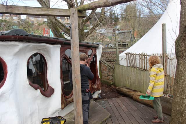 Staff at St Werburgh’s City Farm in Bristol start a clean up operation after burglars smashed windows.