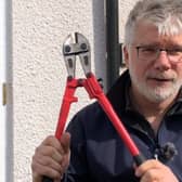 Henry Nurser with the bolt cutters left by thieves who stole his bike