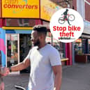 Didun Obilanade with Baz outside Cash Converters after his bike was returned to him