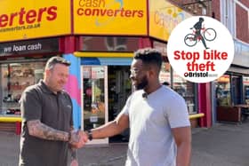 Didun Obilanade with Baz outside Cash Converters after his bike was returned to him