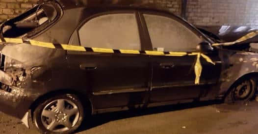 Another vehicle damaged in the fires on Sunday morning