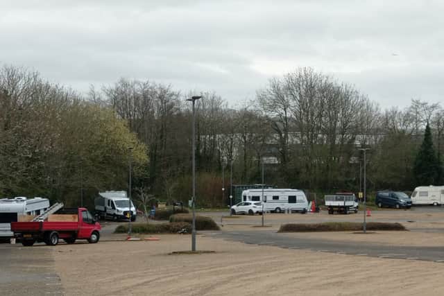 Mix of caravans and works vehicles form the camp at Brislington Park and Ride