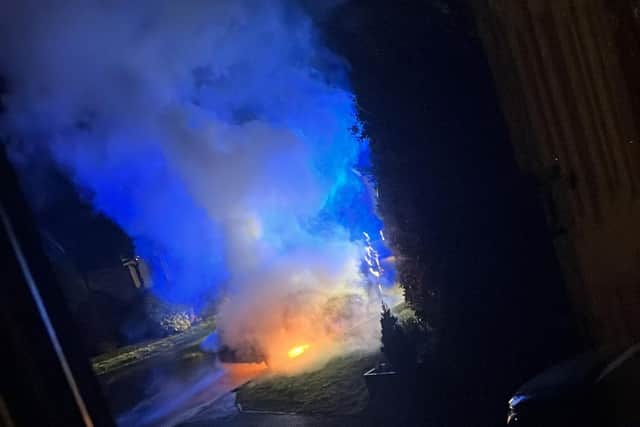 Footage taken by Alex shows the car alight, sending a cloud of smoke billowing into the air.