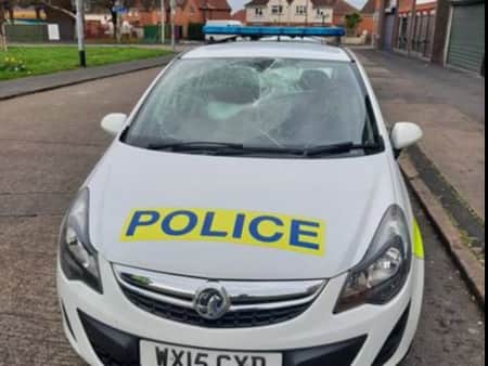 The smashed windscreen of the police patrol vehicle in Knowle