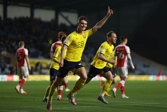Luke McNally after scoring for Oxford United. 