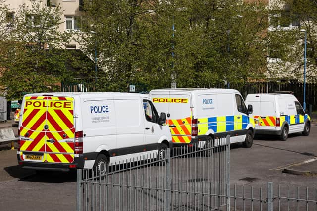 Police forensic teams are at the scene of the woman’s death in Easton
