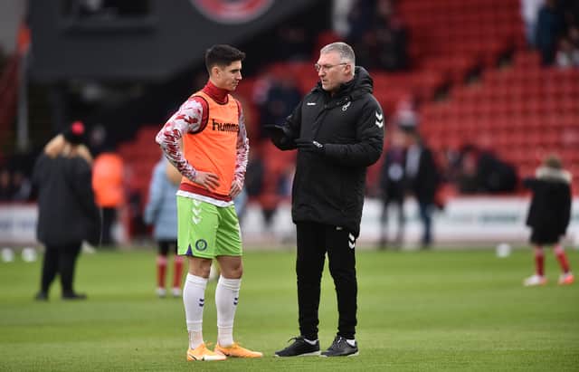 Callum O’Dowda talks with manager Nigel Pearson - but the winger may be leaving Ashton Gate. 