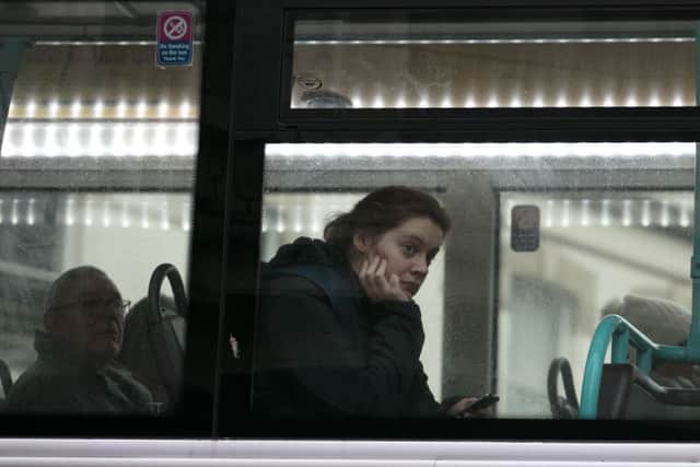  Passengers on a First bus wait for it to leave a stop in Bristol.