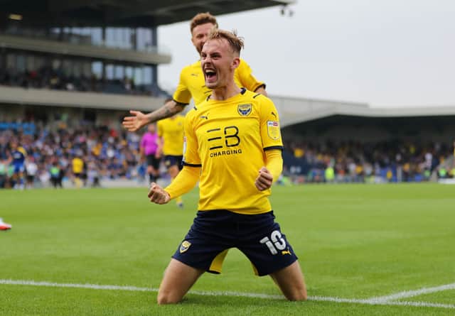 <p>Mark Sykes of Oxford United celebrates after scoring.</p>