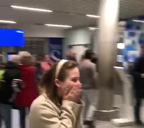 Video grab of the tear-jerking moment a woman welcomed a Ukrainian family at Bristol Airport.