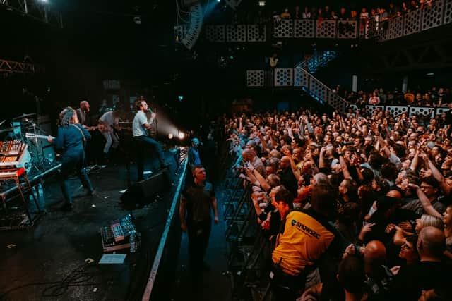 IDLES paid tribute to their close friend and Ukrainian immigrant Danny Nedelko towards the end of their set (Credit: Chris Cooper)