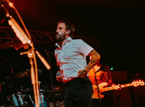 <p>IDLES front man Joe Talbot gets the set going in front of a packed crowd at the O2 (Credit Chris Cooper)</p>