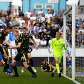 Connor Taylor heads in a second goal for Bristol Rovers at home to Scunthorpe United