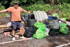 Andrew Varney with rubbish collected at the litter pick.