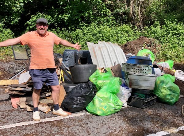 Andrew Varney with rubbish collected at the litter pick.
