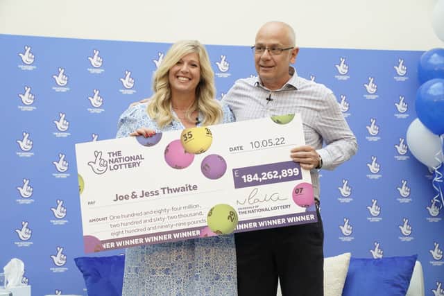 Joe Thwaite, 49, and Jess Thwaite, 46, from Gloucestershire celebrate after winning the record-breaking EuroMillions jackpot of £184M from the draw (PA)