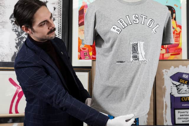 The t-shirts were designed to show solidarity with the Colston Four who were accused then later cleared of pulling down the Colston Statue in 2020. 