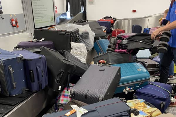 Passengers bags were dumped in a huge pile at Bristol Airport on Friday (June 18)